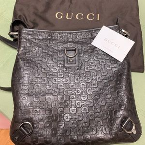 Gucci brown leather monogrammed crossbody bag